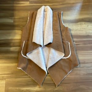 Furry vest, fire inside, corduroy outside, reversible